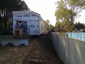 Modular Home pulled by dozer